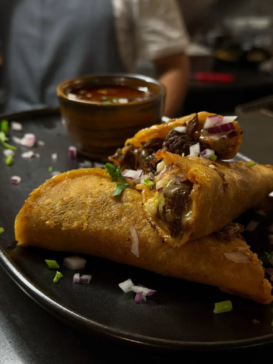 Crisp quesabirria tacos with rich dipping consommé